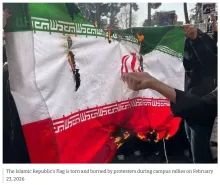 Image showing the Islamic Republic's flag is torn and burned by protesters during campus rallies on February 23, 2026.